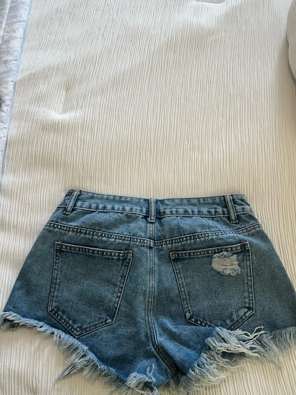 High-Rise Distressed Denim Shorts - Light Blue
